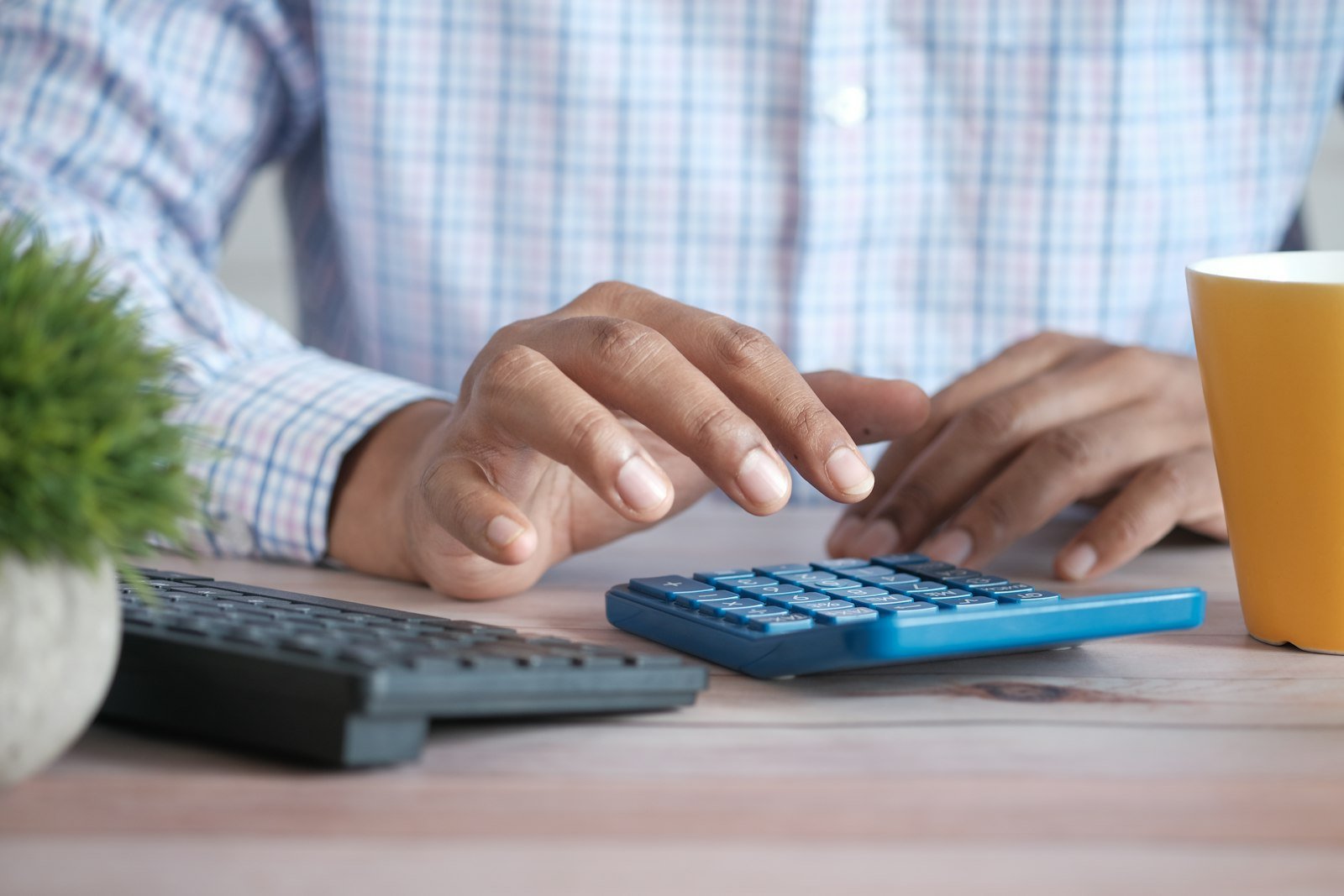 Calculator and paperwork for estimating property taxes