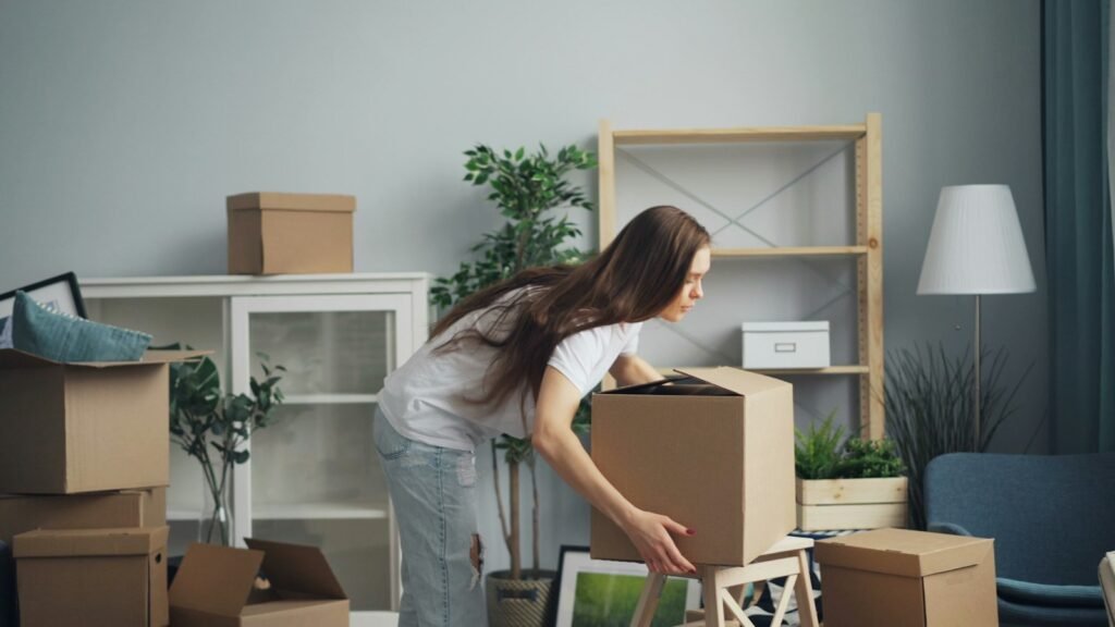 Unpacking moving boxes in a new home