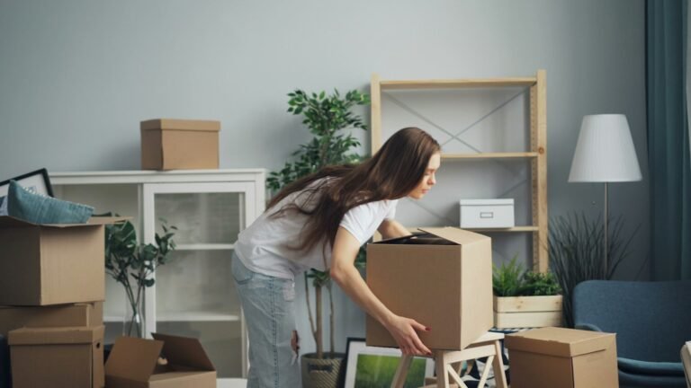 Unpacking moving boxes in a new home