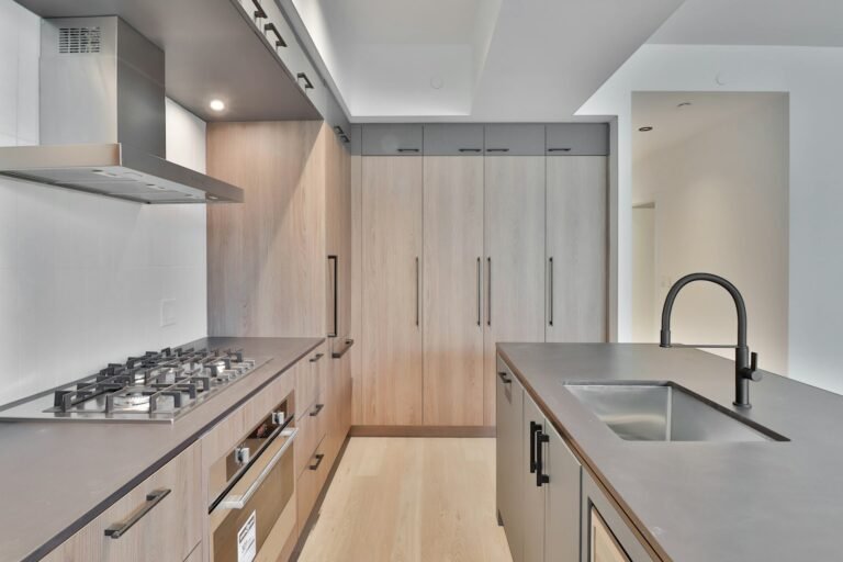Kitchen with range and sink