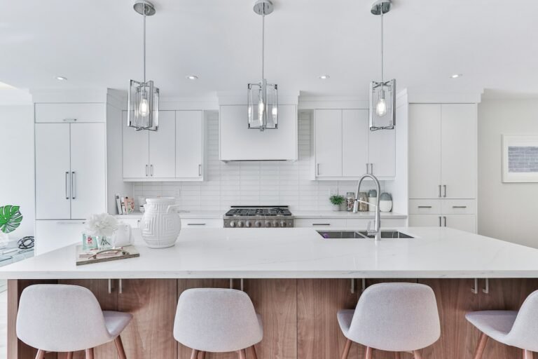 Kitchen with white and wood cabinets